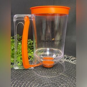 Blackstone Transparent and Orange Batter Dispenser